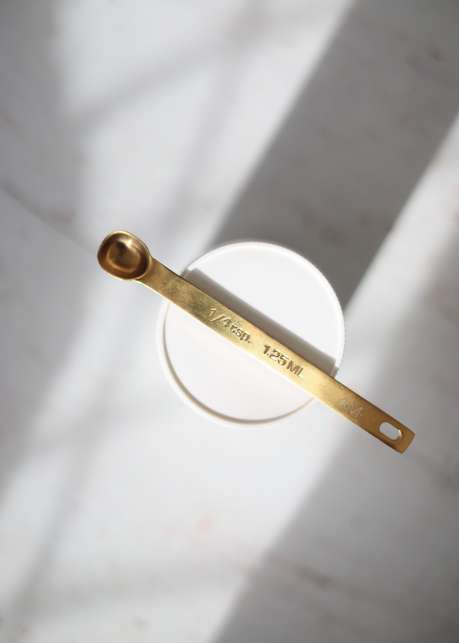 AM GOLD SPOON