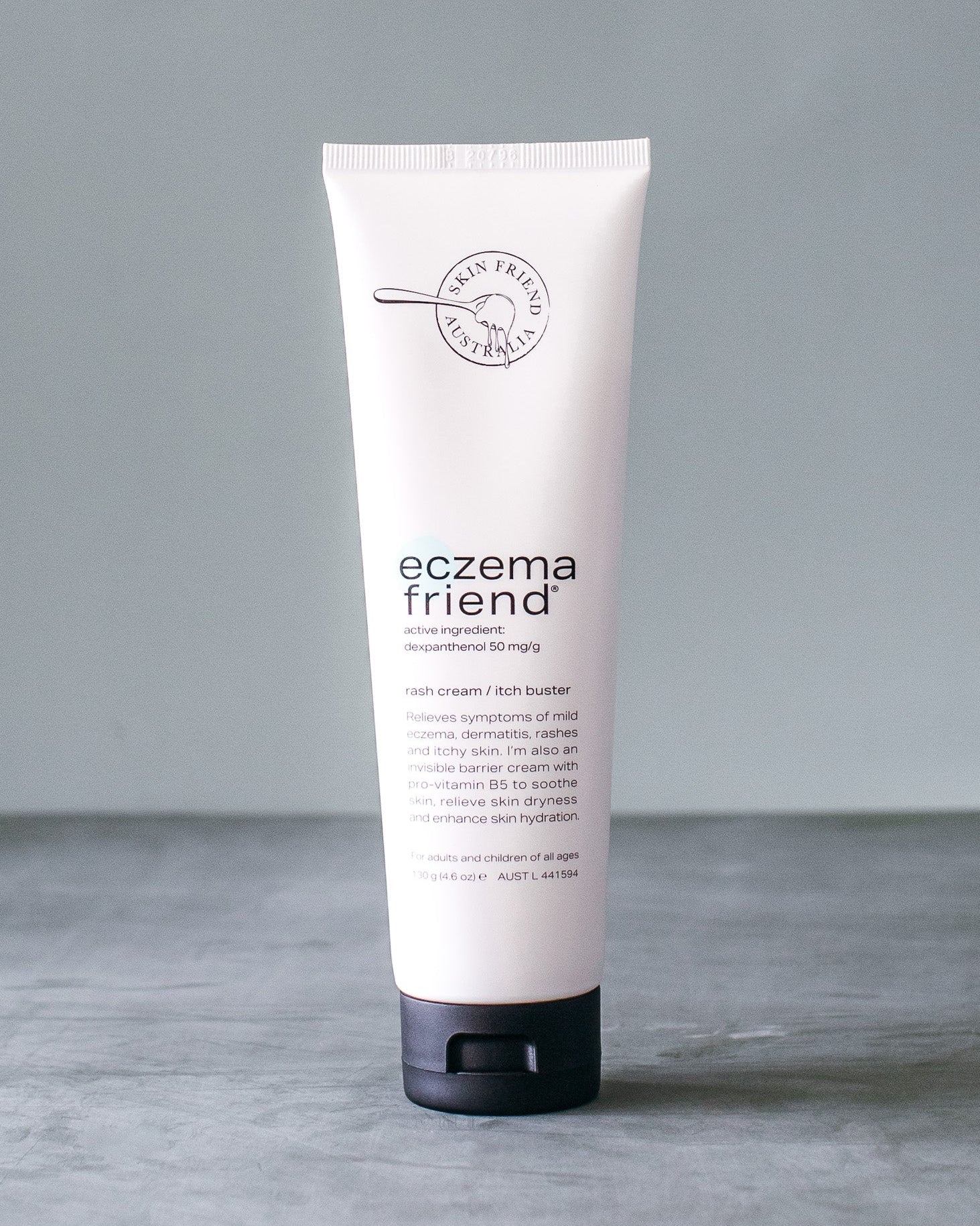 Tube of 'eczema friend' cream on a gray background
