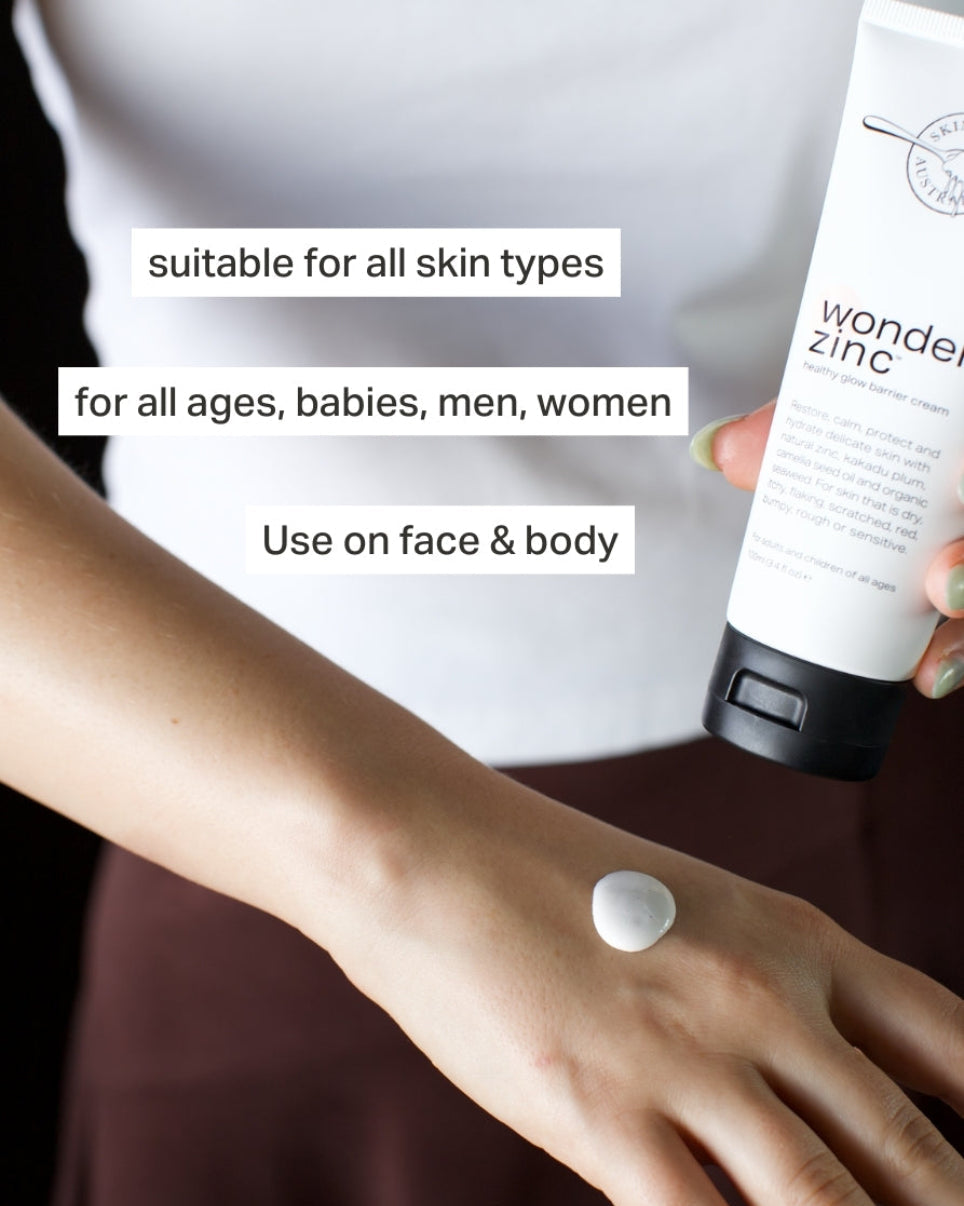 Person applying Wonder Zinc cream to their arm with text indicating suitability for all skin types and ages.