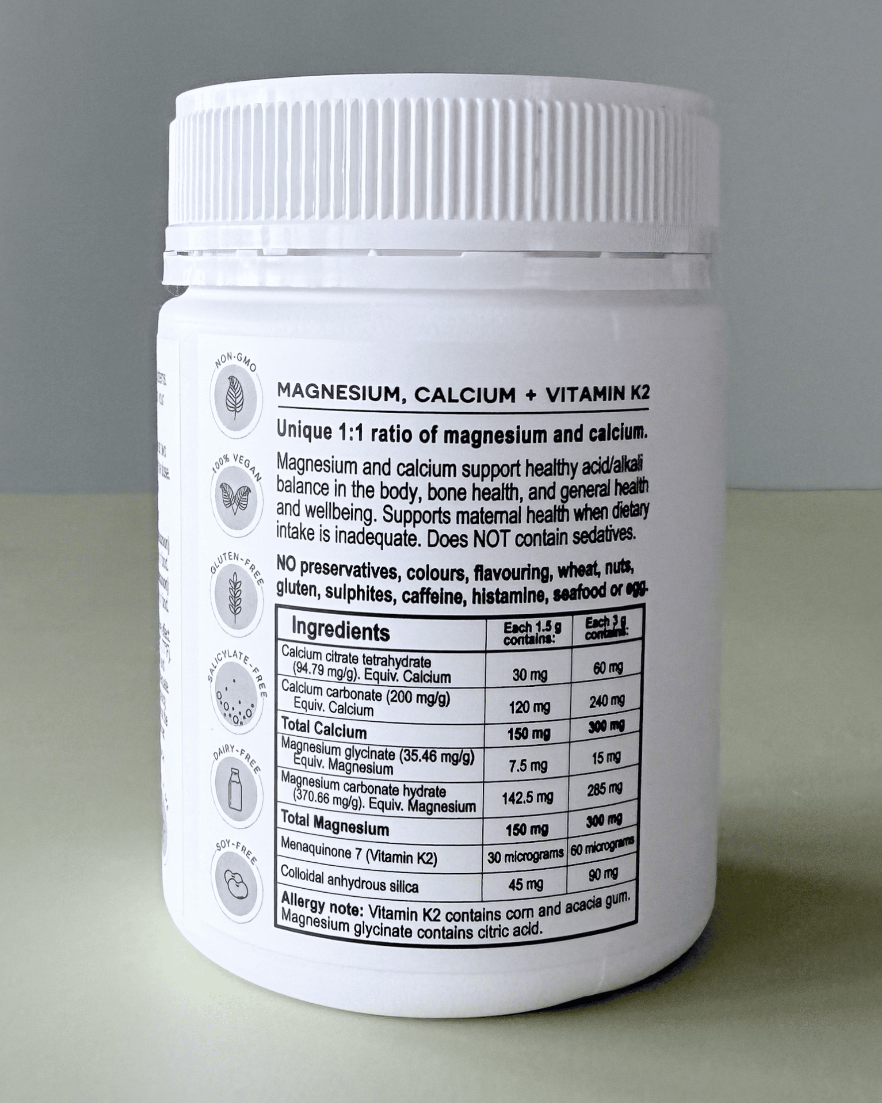 Supplement container with label on a gray background